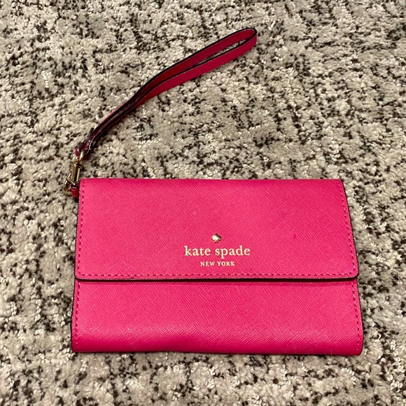 kate spade Handbags - Kate Spade ♠️ fuchsia tri-fold wallet/wristlet